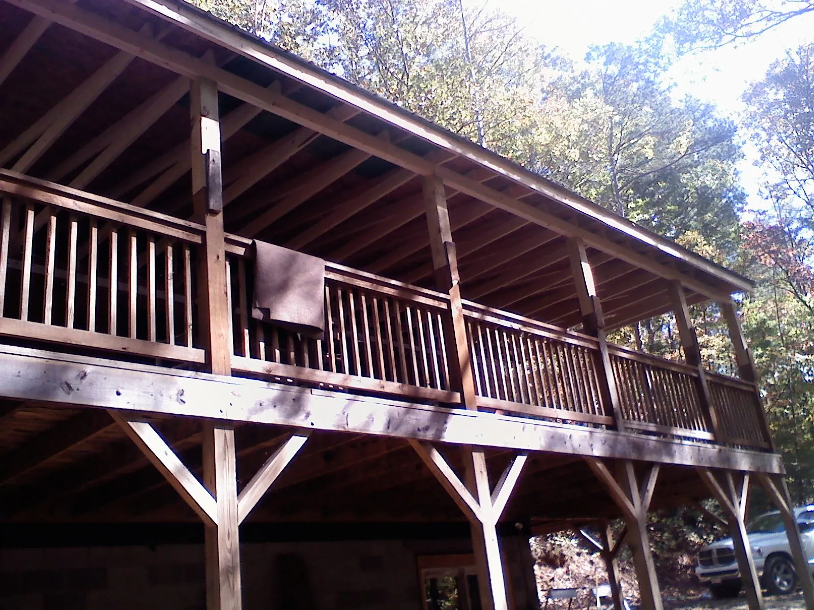 Timber framing under a new elevated porch and deck — Roof Leak Repair in Alexander City by Roofing Brothers